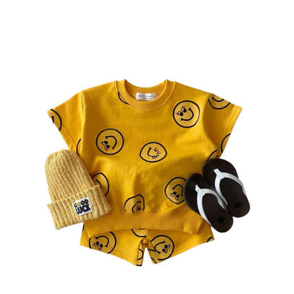 Littlelooks | Stralend De Dag In – Smiley Kinderoutfit